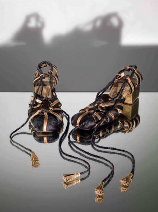 Salvatore Ferragamo, Sandal, 1930, Spalletti / Satin and kid upper, gilded brass heel with ankle strap in silk passementerie cord. The model belonged to Countess Alessandra della Gherardesca SpallettiFirenze, Museo Salvatore FerragamoFoto Arrigo CoppitzSEZ