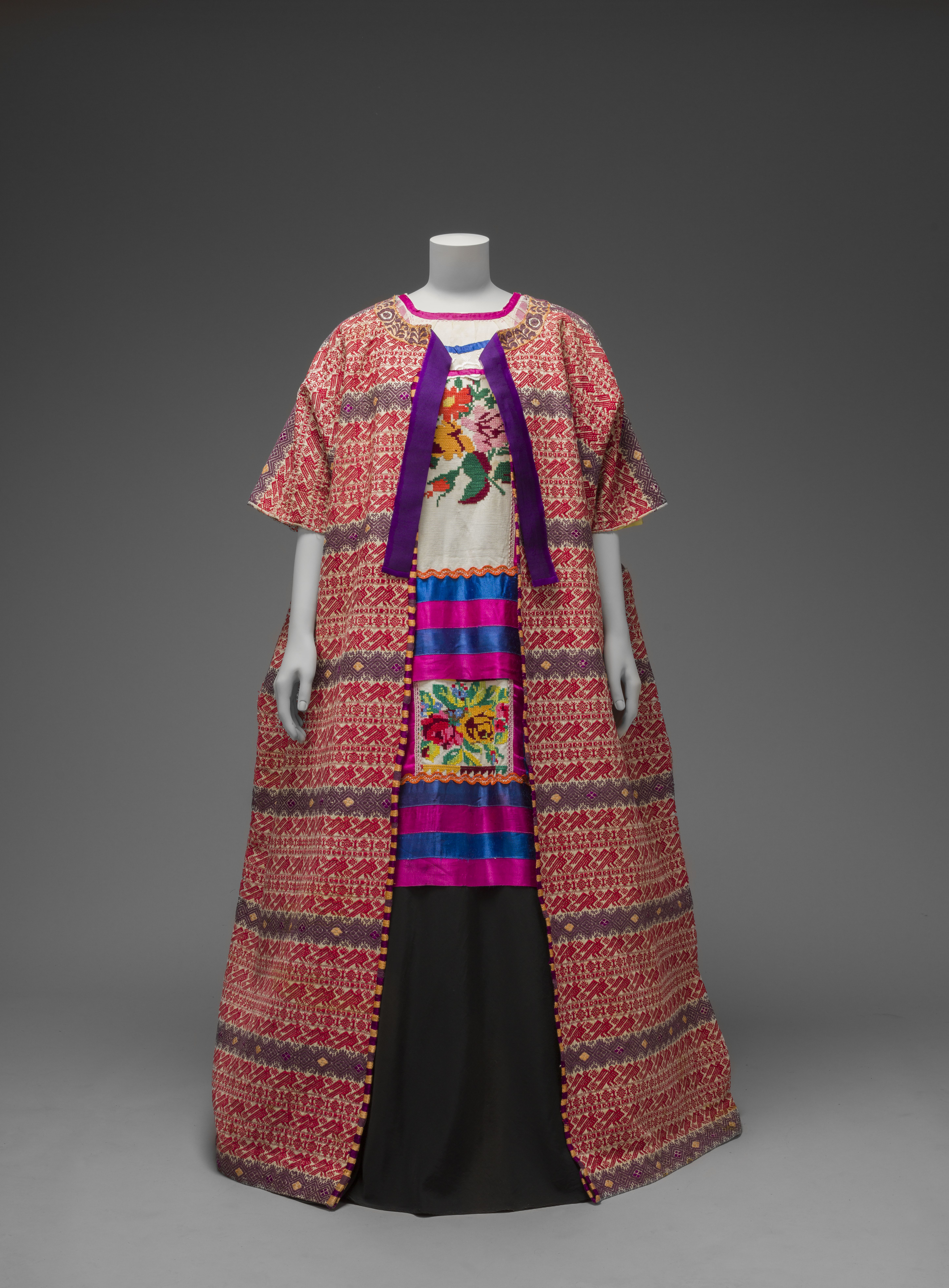Guatemalan cotton coat worn with Mazatec huipil and plain floor - length skirt Museo Frida Kahlo © Diego Rivera and Frida Kahlo Archives, Banco de México, Fiduciary of  the Trust of the Diego Riviera and Frida Kahlo Museums.