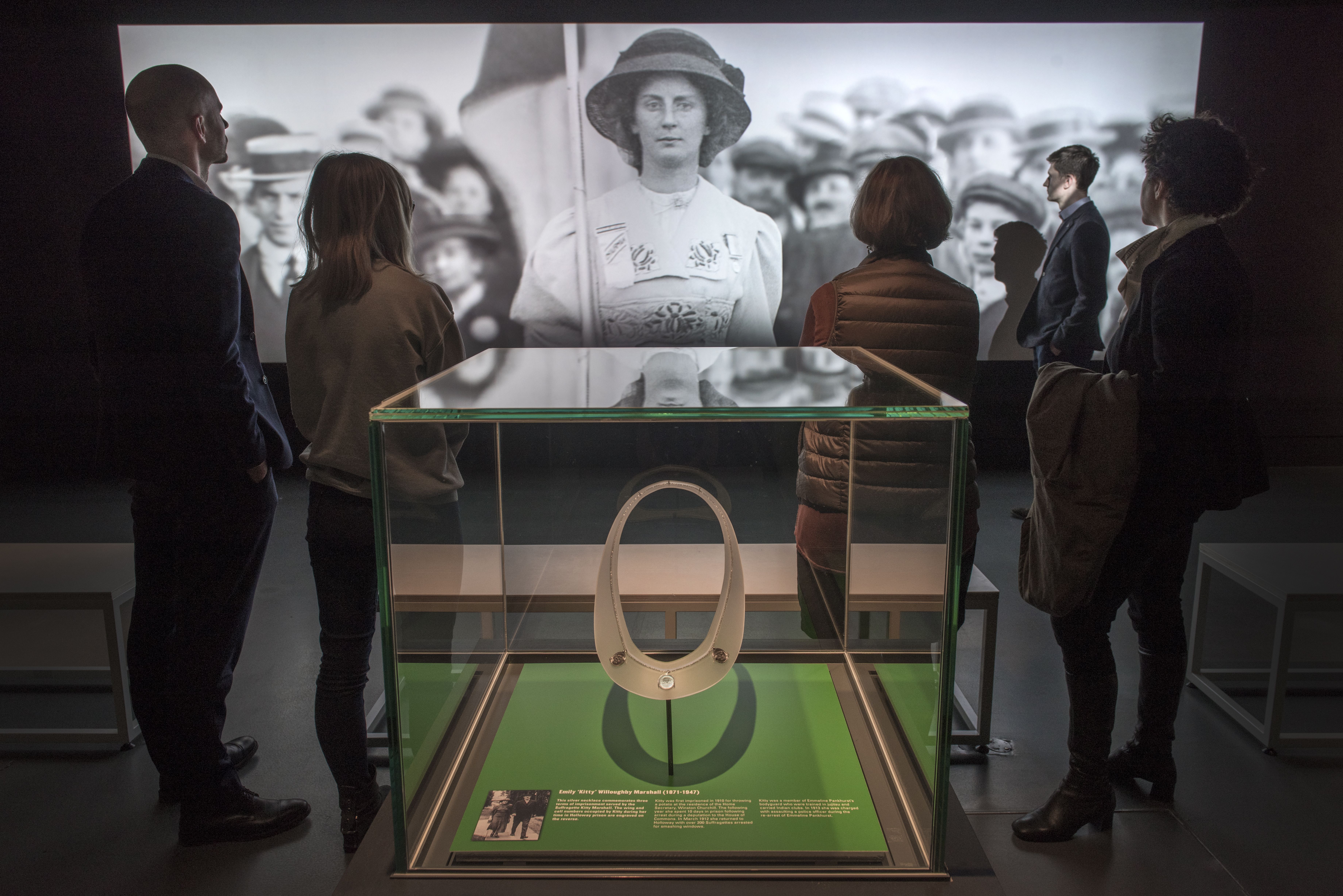 Visitors watch a specially curated film in Votes for Women display © Museum of London.